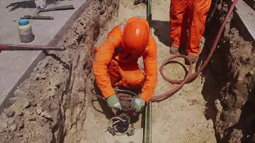 Техника прокладки магистральной магистрали с живым газом в Unitil